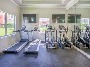 24-Hour fitness center, spin room, cardio room & free weights